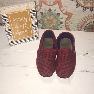 TOMS red and black buffalo plaid slides.